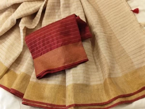 Cotton slub Beige saree with golden check design Cotton slub Beige saree with golden check design